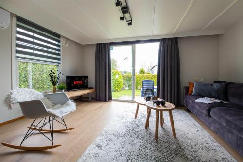 Oisterwijk Ski Chalet | 37, located in a quiet & wooded area!