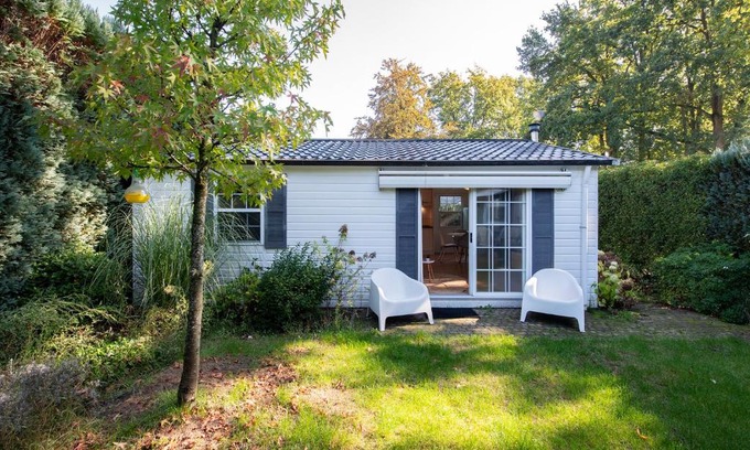 Oisterwijk Ski Chalet | 84, gelegen in het rustige & bosrijke Oisterwijk! Met privétuin