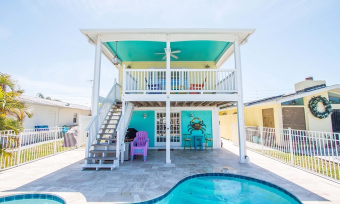 Flor-a-mar House | A bit of Key West in New Port Richey: Bright Home w/Pool & Boat Dock Access!