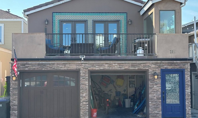Newport Shores Condo | A Block From The Waves and Newly Remodeled.