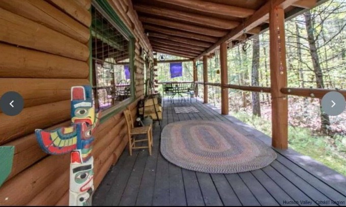 Kerhonkson House | A modern "State of the Art" Log Cabin nestled in a serene wooded property.