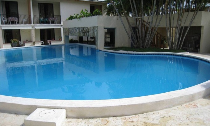 ProCab Apartment | A short walk to shop and beach, lovely Ground-floor condo with pool