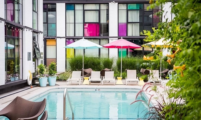 West Fens Hotel | ADA Queen Trailer w/Patio, Outdoor Pool. Onsite Bar & Dining, Near Museums!