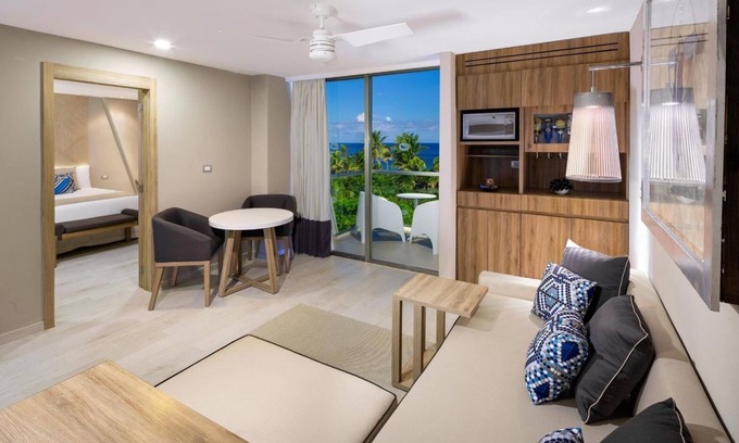Downtown Cancun Resort | All inclusive mini suite and balcony at Grand Sirenis on the Riviera Maya