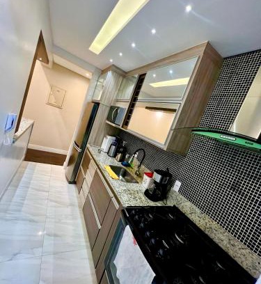 Vila Julia Apartment | Ap Moderno com vista mar Piscina Ar Condicionado no Guarujá