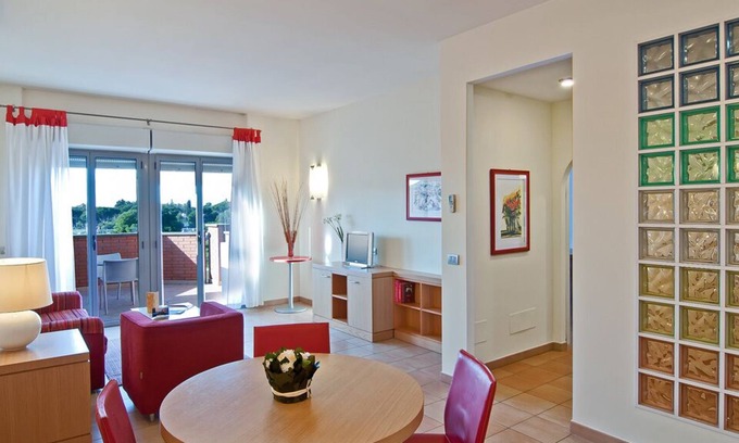 Zona XXX Castel Fusano Apartment | Apartment spacious Long Stay Rome Area I Triangoli with garden in the backyard
