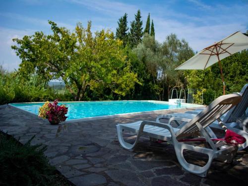 Ghizzano House | Apartment with large garden and pool on the hills of Pisa
