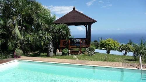 Les Avirons Apartment | Appartement convivial avec vue sur la mer