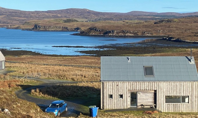 Skinidin House | Architect designed eco house with stunning loch and Mountain Views