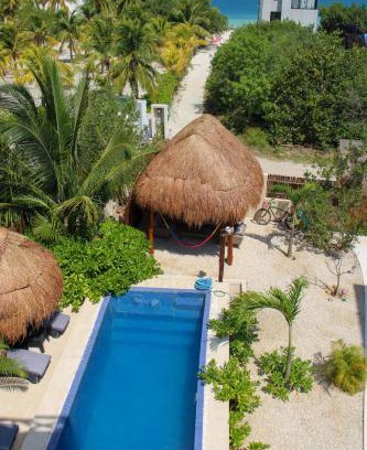 Isla Holbox Apartment | AteneaHolbox 3 story building