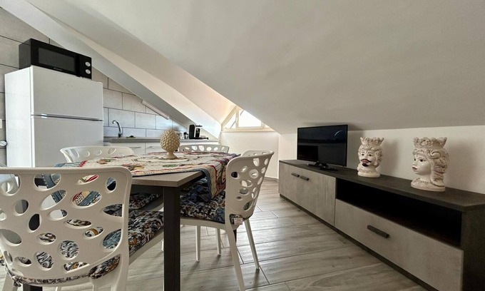 Aci Sant'Antonio Apartment | Attic room is unique and cozy in the center of the village.