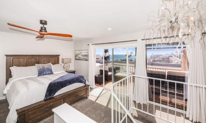 Townsite Condo | B306 - Luxury Penthouse with spacious deck. Enjoy ocean View from Deck lounge sun bed