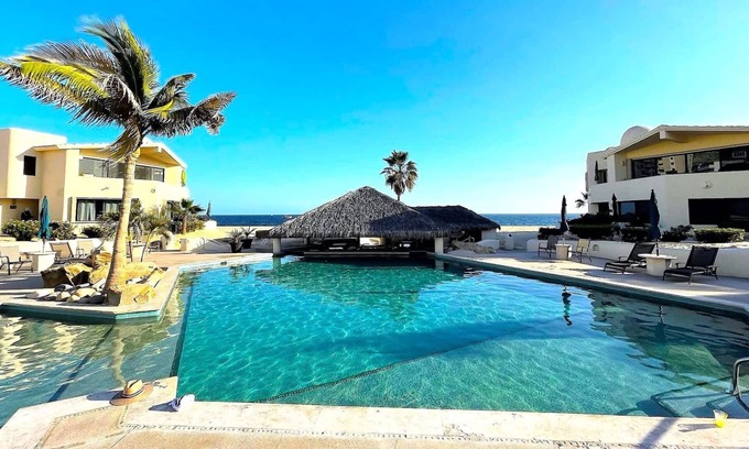 Centro Condo | Beachfront Retreat with Patio, BBQ Grill and Pools