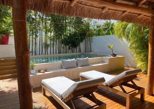 Puerto Juarez Villa | Beachside Haven with Private Pool Your Tranquil Family Retreat Awaits