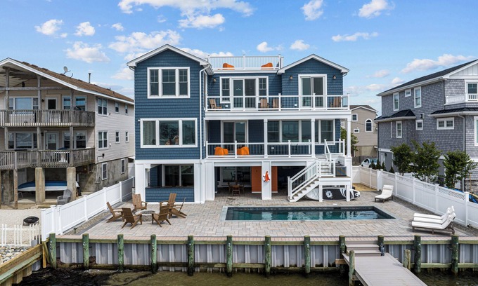 Ship Bottom House | Beautiful Bayfront w/Heated Pool & Dock. 6 Bedrooms, all w/Ensuite Bathrooms.