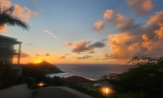 Great Cruz Bay Condo | Beautiful ocean views throughout. Conveniently located near town. Large porch!