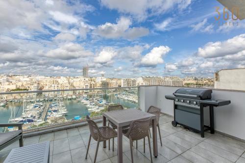 Pieta Apartment | Beautiful seafront home with private balcony & BBQ by 360 Estates