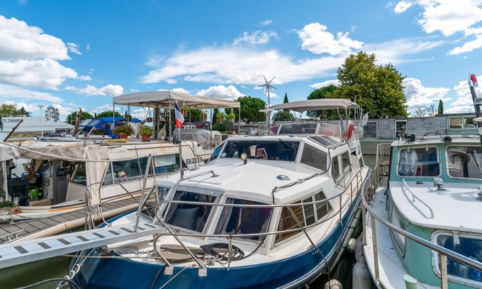 Bellegarde Boat Rental | Boat 'Penichette Odyssey Croisieres' with Lake View, Private Terrace and Air Conditioning