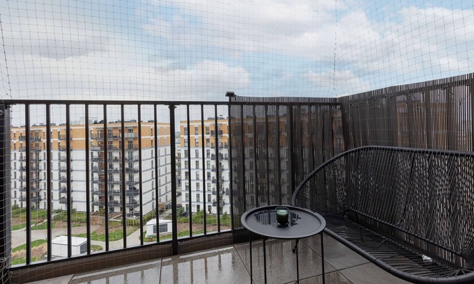 Wlochy Apartment | Borsucza Modern Apartment by Renters