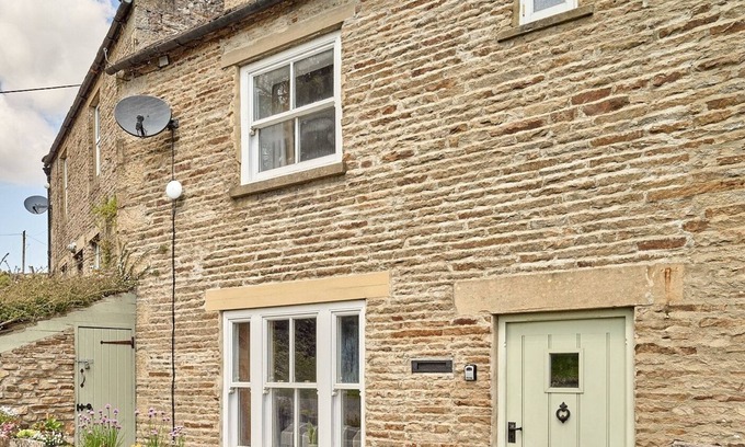 Langthwaite Cottage | Bridge End is an enchanting haven for up to three guests, set in the picturesque village of Langthwa