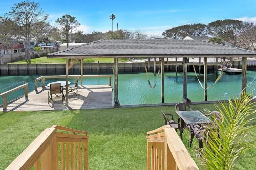 Butler Beach House | Canal Home Dock Walk to Beach Kayaks SUP Fishing