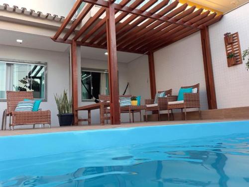 Piuma House | Casa com Piscina e Churrasqueira e excelente Localização em Piuma