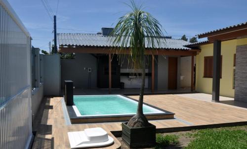 Capao da Canoa House | Casa Com Quatro Dormitórios Pertinho Do Mar Em Capão Da Canoa