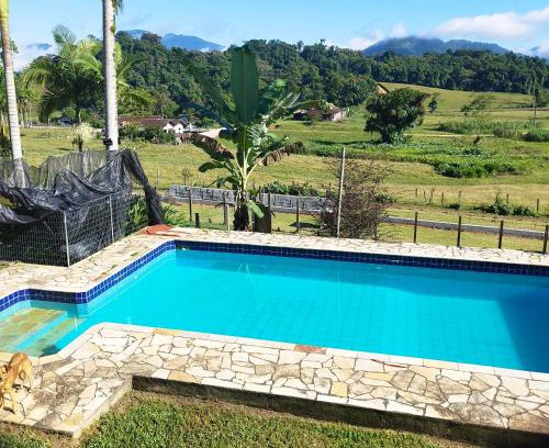 Pomerode House | Casa suíça luxo-suite nr2- 3 pessoas