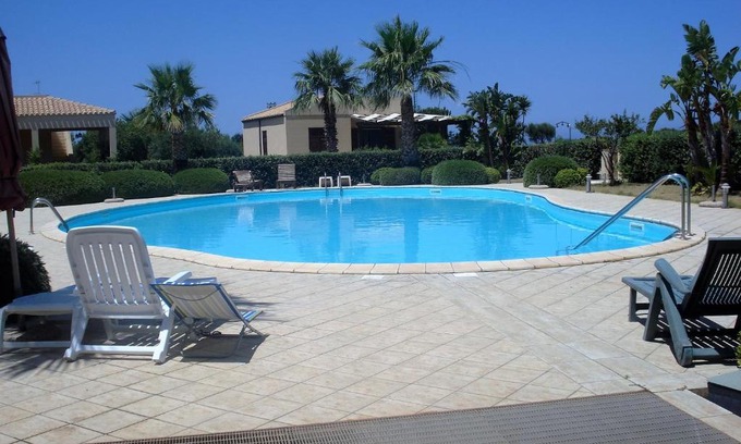 Custonaci House | Casa Vacanze Libeccio - Villetta con giardino e piscina condominiale