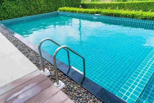 Wuse 2 Apartment | Central Oasis - Entire 3 Bedroom Apartment in Abuja with Pool, Games, WiFi, Balcony, and Garden