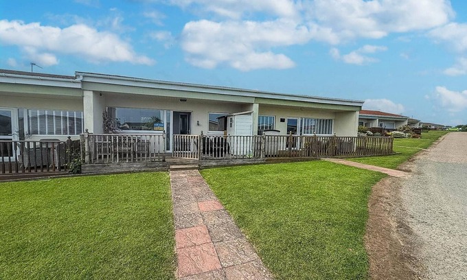 Bacton Ski Chalet | Chalet for hire at Rainbows End near a beautiful Norfolk beach ref 31039R