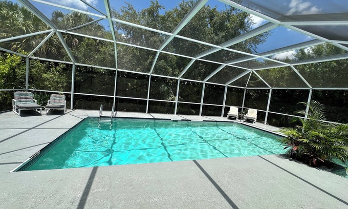 Lehigh Acres House | Charming 4-bedroom house with headed pool, AC, wifi and games. Fun for all!