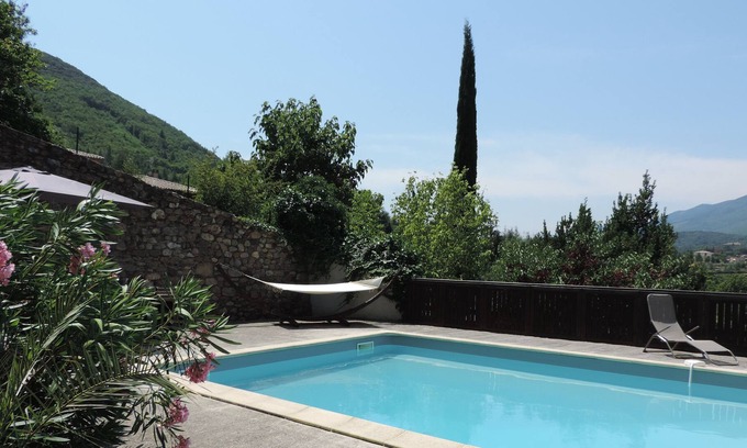 Olargues House | Charming holiday home with large swimming pool, nestled in a mature garden.