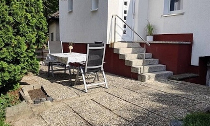 Hagen Apartment | Charming house within a house - vacation & business apartment with private terrace.