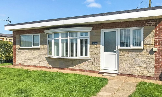 Chapel Saint Leonards Cottage | Comfortable bungalow with one double and one twin.