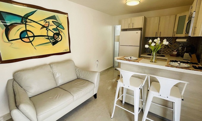 Bucana Apartment | Compact Haven with Private Entrance and FREE Parking and Laundry