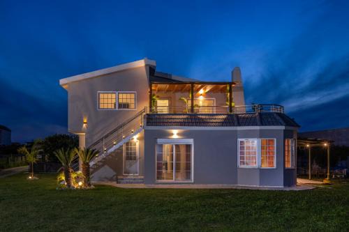 Petaloudes House | Coral Paradise Luxury Modern Family Villa with Jacuzzi, Pool View & Parking in Rhodes Island