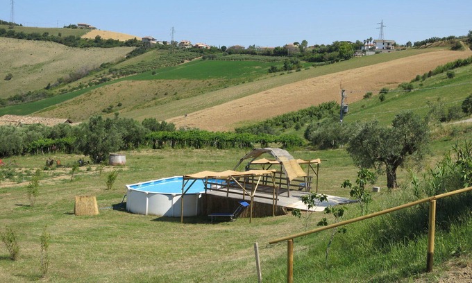 Cologna Spiaggia Villa | Cosy apartment in villa with hot tub, A/C, WIFI, pool, TV, patio, pets allowed and panoramic view