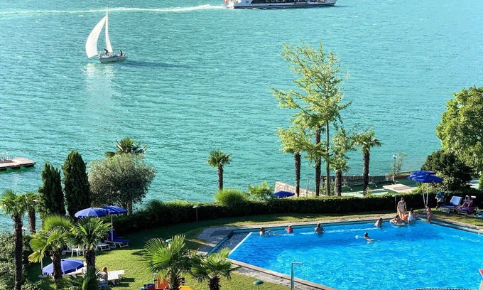 Bissone Apartment | Cosy apartment for 4 guests with pool, A/C, WIFI, TV, balcony and panoramic view