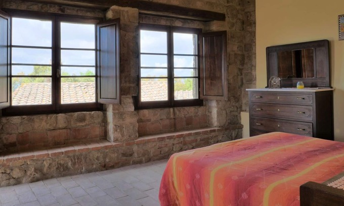 Roccastrada Villa | Cosy apartment in villa for 4 people with pool, WIFI, TV, balcony and parking