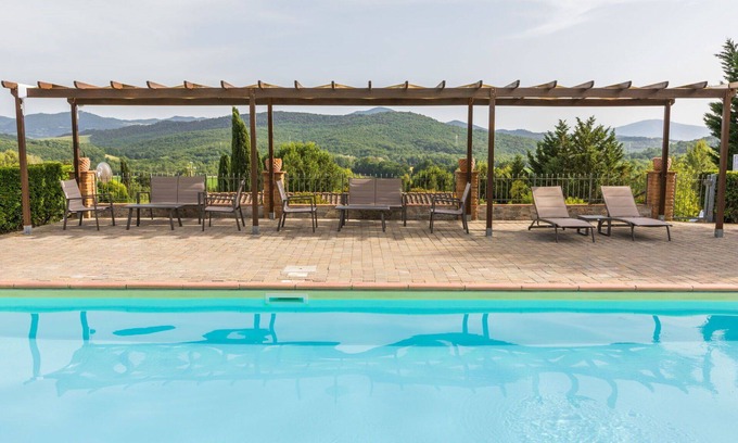 Montecatini Val di Cecina House | Cosy apartment in villa for 4 people with A/C, pool, WIFI, TV, terrace, pets allowed and parking