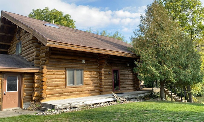 Pentwater Cabin | Cozy cabin on the serene Pentwater River with hot tub and ac