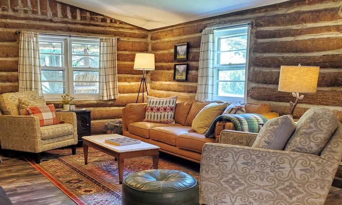 Spruce Pine Cabin | Cozy Hand Built Log Cabin Rocking Chair Porch King Bed