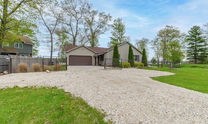 Manistee House | Cozy Lakefront Home, Minutes from Lake MI, 2 Bedrooms, 2 Bathrooms. Sleeps 6