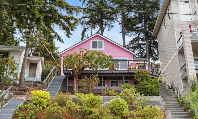 Camano Island House | Darling pink beach house with epic views in a cozy community.