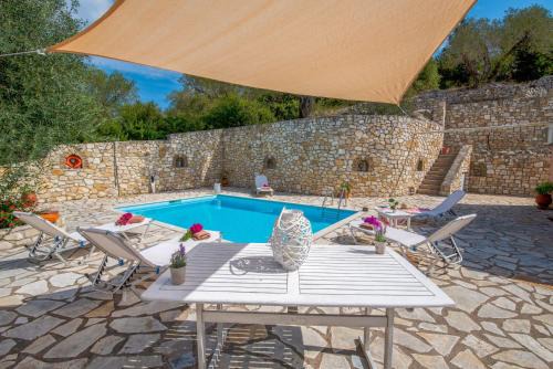 Ieromonachos House | Dive into Summer - Kirki's Cozy Pool Gem on Paxoi