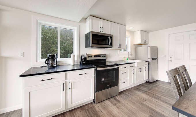 Edgewater Shores Cottage | Dog-friendly oceanfront retreat with hot tub & relaxing deck facing the water