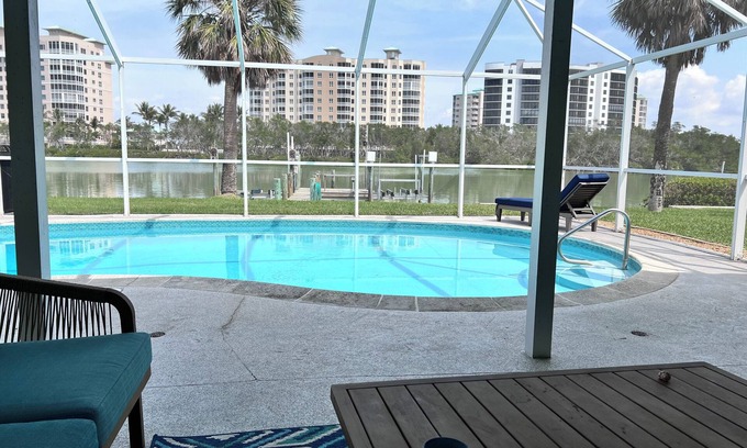 Laguna Shores House | DOLPHIN PARADISE: WATERFRONT VIEWS, WALK TO BEACH, PRIVATE POOL, DOG FRIENDLY