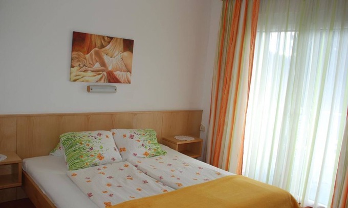 Klopein Bed & Breakfast | Double room, balcony, lake view/lake side - Pension Agnes