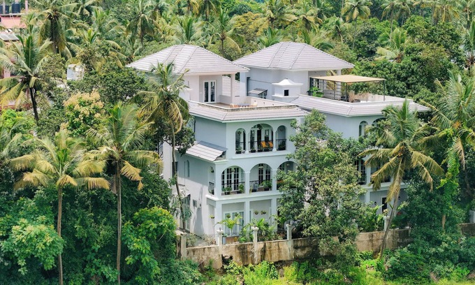 Gauravaddo Villa | Esh Cottages Birch | Hillside 4-BHK Hideaway With Lush Garden, Common Pool, & Gaming Zone